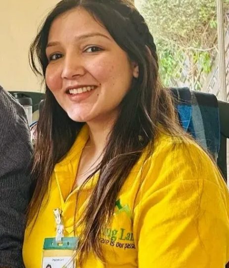 Caring Lane carer in yellow uniform