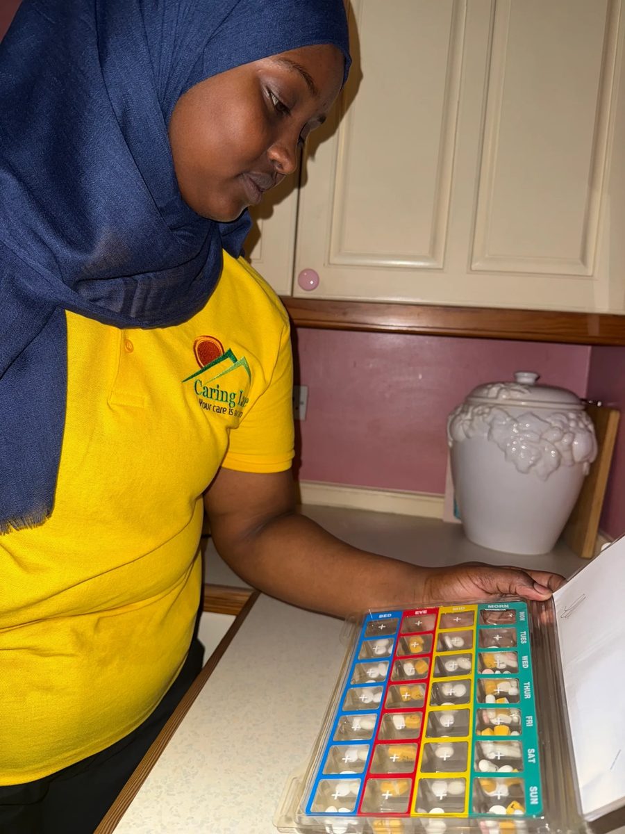 Caring Lane carer supporting medication routine